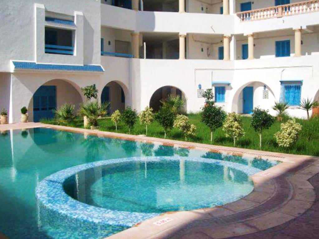 Apartment with one bedroom in Akouda with shared pool and enclosed garden 200 m from the beach