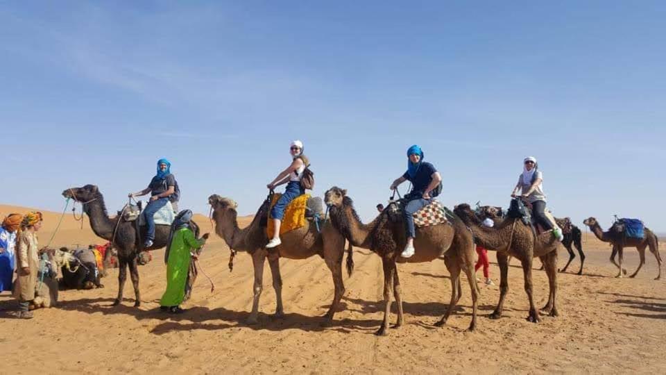 morocco camel riding luxury camp image 1